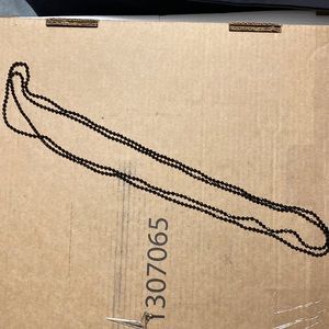 Long black beaded necklace, purchased in Seaside, Fl